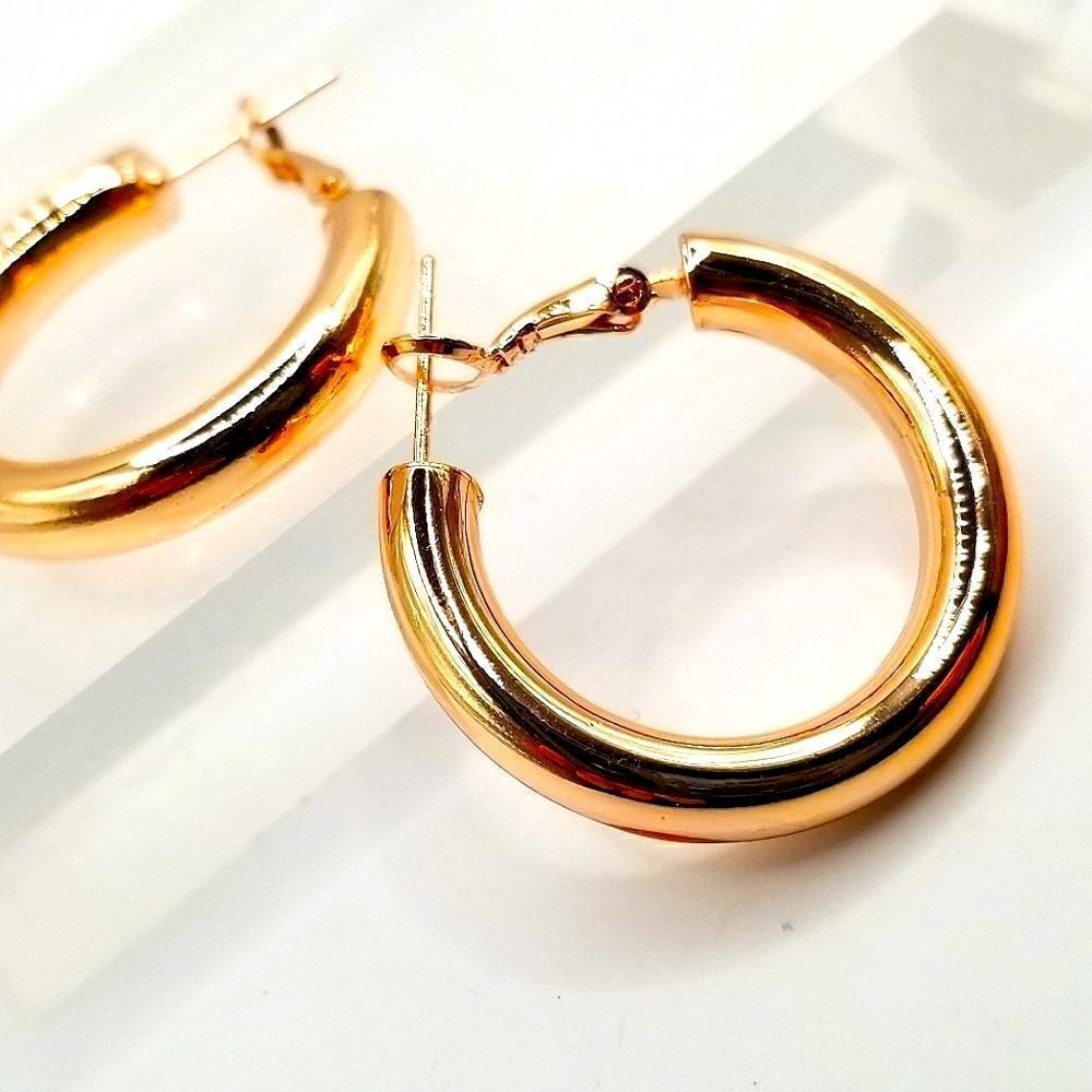 Rose gold toned hoop earrings High Polished Click Top Hoop Earrings .